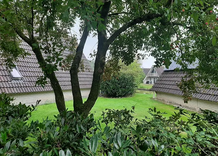 Luxe vijverlodge met houtkachel aan viswater - Lodge Lomi